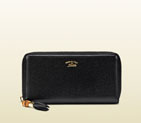 Gucci bamboo tassel leather zip around wallet 307984