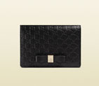 Gucci bow microguccissima leather train pass case 388684