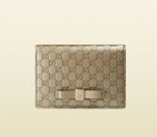 Gucci bow microguccissima leather train pass case 388684