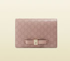 Gucci bow microguccissima leather train pass case 388684
