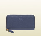 Gucci exclusive bamboo tassel blue leather zip around wallet 307984