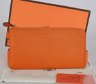 Hermes Zipper Wallet clemence leather in Orange A908