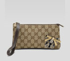 wristlet with 'leroy' guccioli embroidery, bow, an 224072 F4C5G 9799