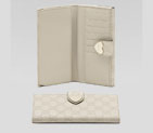 continental wallet with engraved gucci script hear 203550 AA61G 9022
